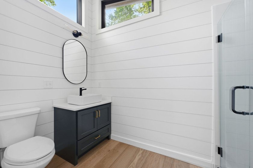 Perched on 1.12 private acres, this custom-built Timbercraft - photo 28