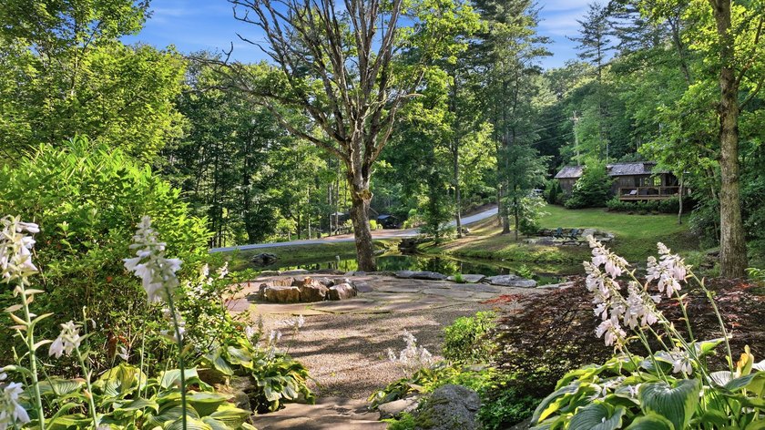 Perched on 1.12 private acres, this custom-built Timbercraft - photo 33