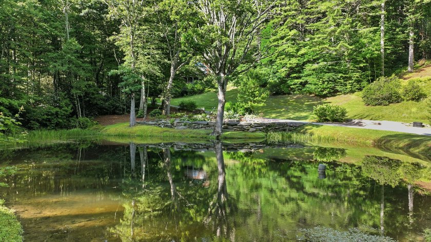 Perched on 1.12 private acres, this custom-built Timbercraft - photo 34