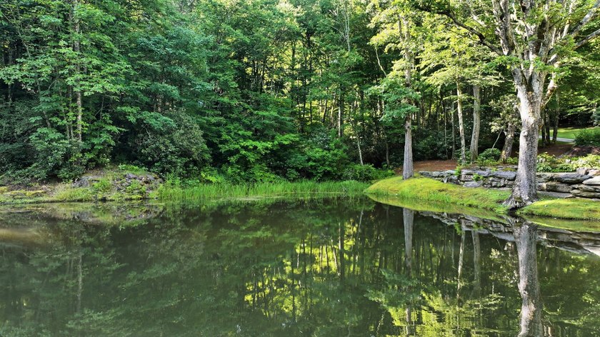 Perched on 1.12 private acres, this custom-built Timbercraft - photo 35