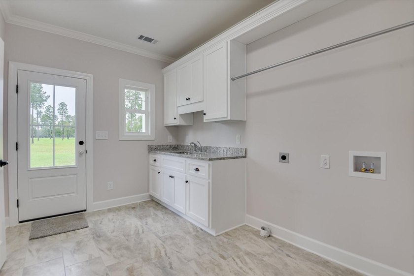 410 Kershaw Place SE is an exceptional 2026 custom-built home - photo 19