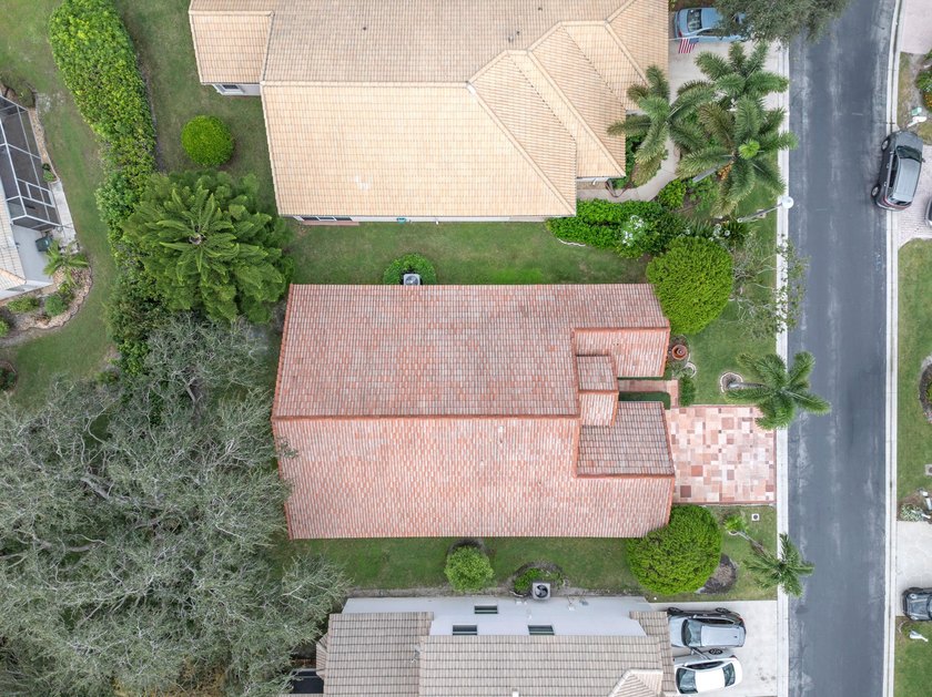 Move right into 3/2/2 in gated River Bridge. Newly painted, Roof - photo 5