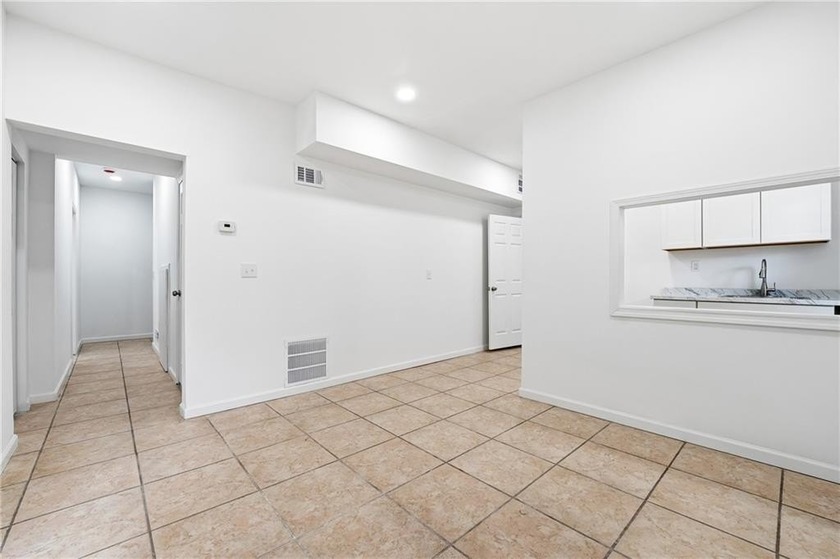 Beautifully renovated and move-in ready, this spacious 6-bedroom - photo 32