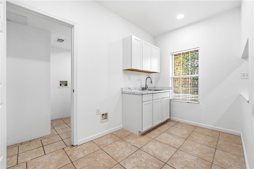Beautifully renovated and move-in ready, this spacious 6-bedroom - photo 34