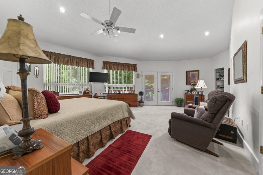 Tucked away on 5.38 peaceful acres, you'll find The LODGE at - photo 16