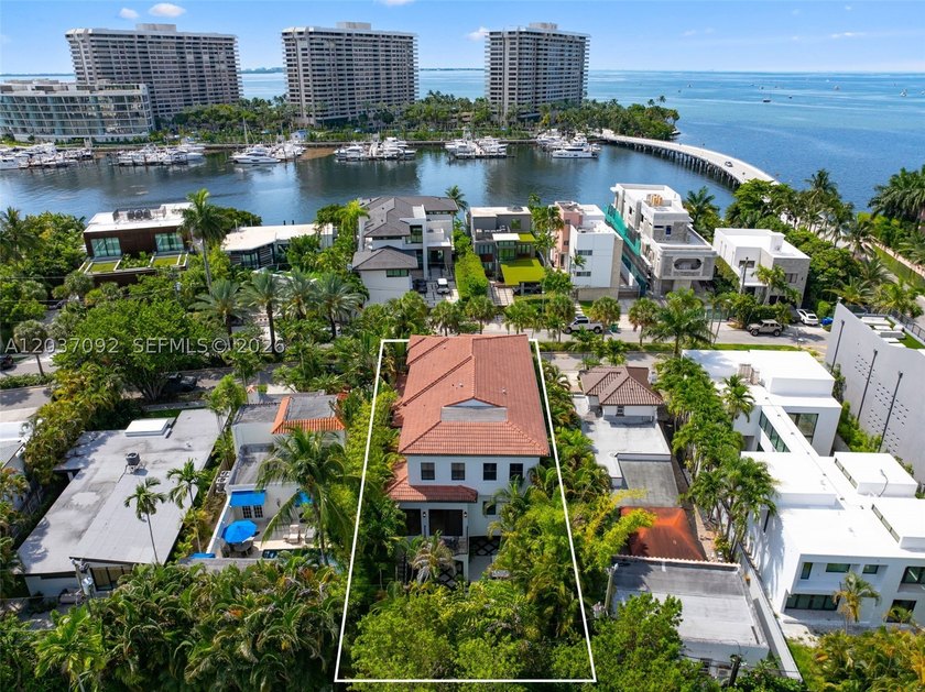 Completely renovated in 2025, this gated three-story residence - photo 2