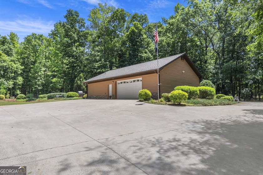 Tucked away on 5.38 peaceful acres, you'll find The LODGE at - photo 36