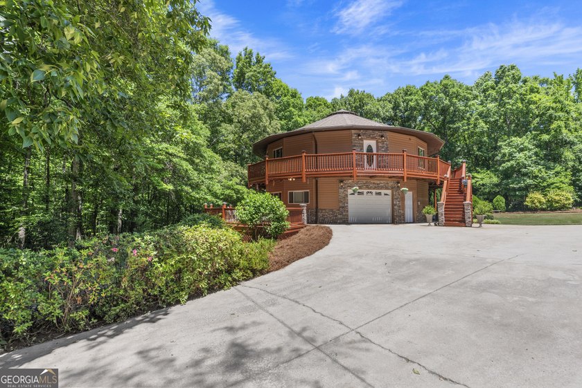 Tucked away on 5.38 peaceful acres, you'll find The LODGE at - photo 41