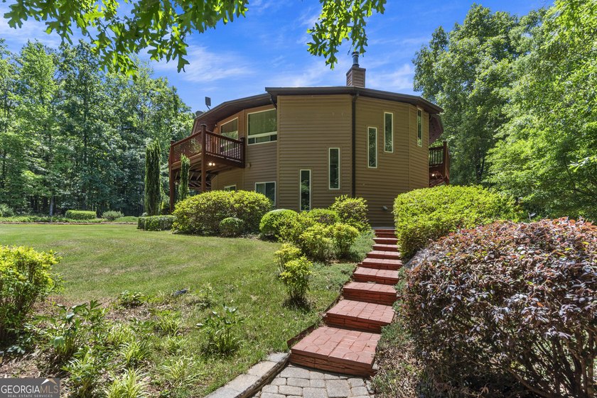 Tucked away on 5.38 peaceful acres, you'll find The LODGE at - photo 47