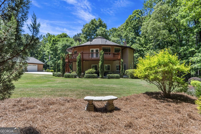 Tucked away on 5.38 peaceful acres, you'll find The LODGE at - photo 48