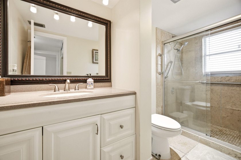 Beautifully maintained 2nd-floor 1-bedroom, 1.5-bath condo with - photo 12
