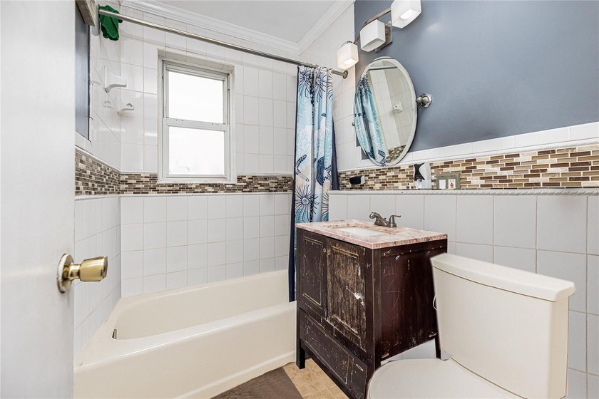 Welcome to 4101 Paulding Avenue, a charming brick single-family - photo 14