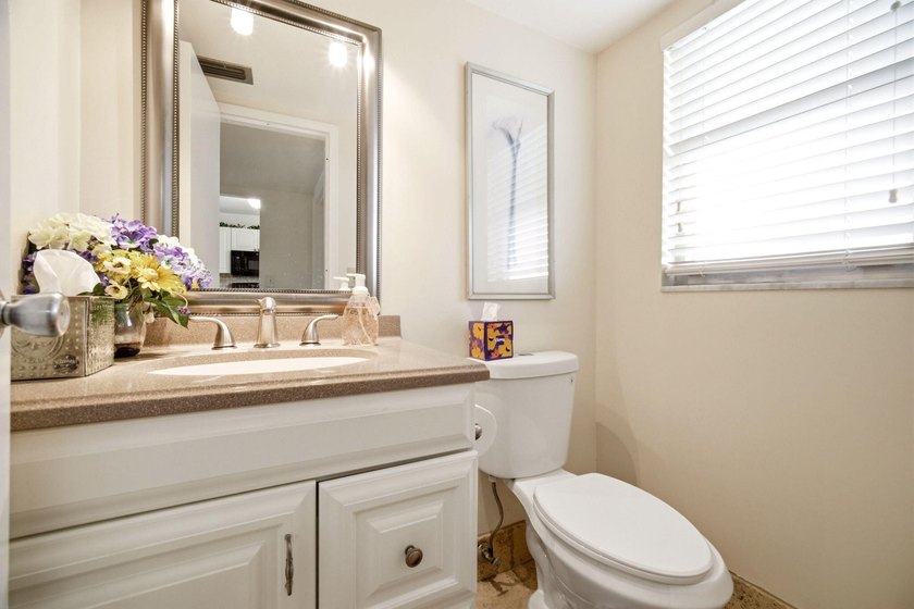 Beautifully maintained 2nd-floor 1-bedroom, 1.5-bath condo with - photo 17