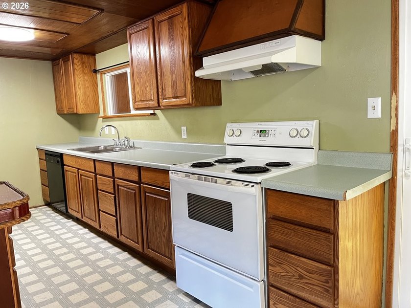 This charming 2-bedroom, 1-bath manufactured home sits on a - photo 17