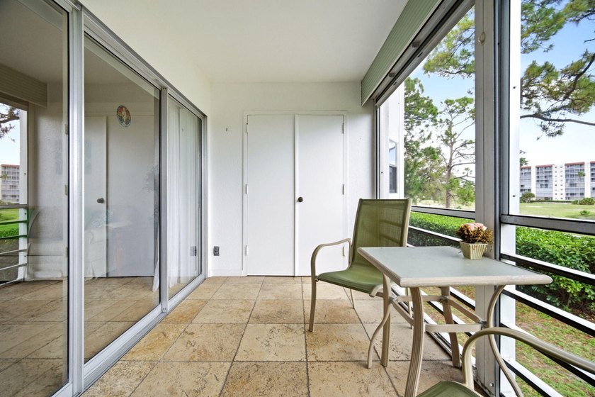 Beautifully maintained 2nd-floor 1-bedroom, 1.5-bath condo with - photo 19