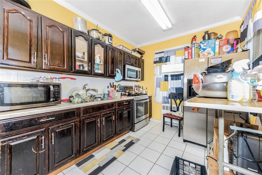Welcome to 4101 Paulding Avenue, a charming brick single-family - photo 20