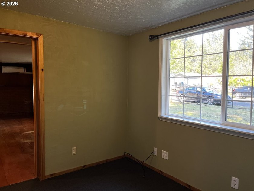 This charming 2-bedroom, 1-bath manufactured home sits on a - photo 29