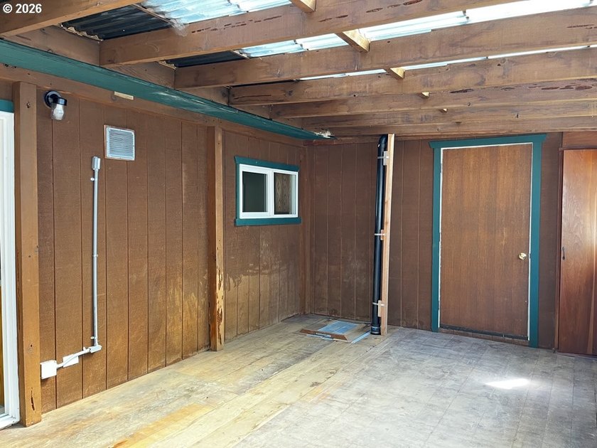 This charming 2-bedroom, 1-bath manufactured home sits on a - photo 34