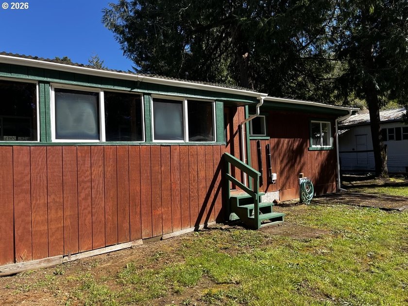 This charming 2-bedroom, 1-bath manufactured home sits on a - photo 38