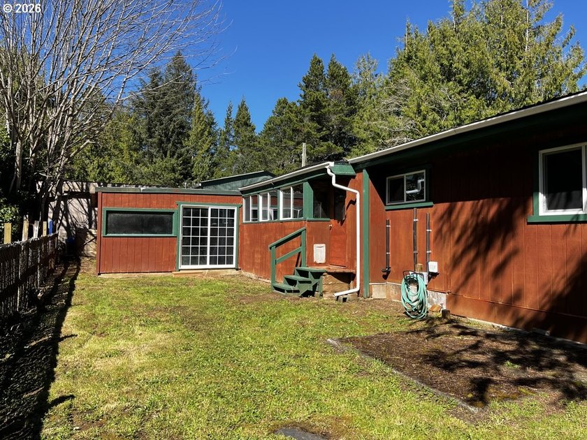 This charming 2-bedroom, 1-bath manufactured home sits on a - photo 39