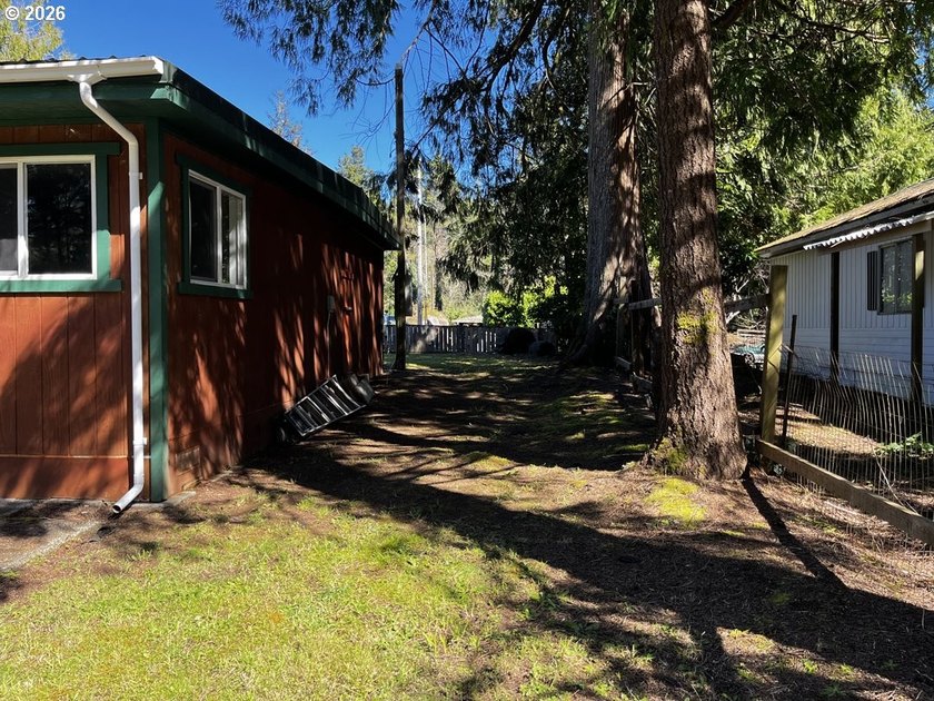 This charming 2-bedroom, 1-bath manufactured home sits on a - photo 41