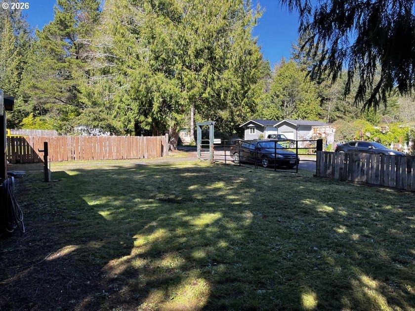 This charming 2-bedroom, 1-bath manufactured home sits on a - photo 43