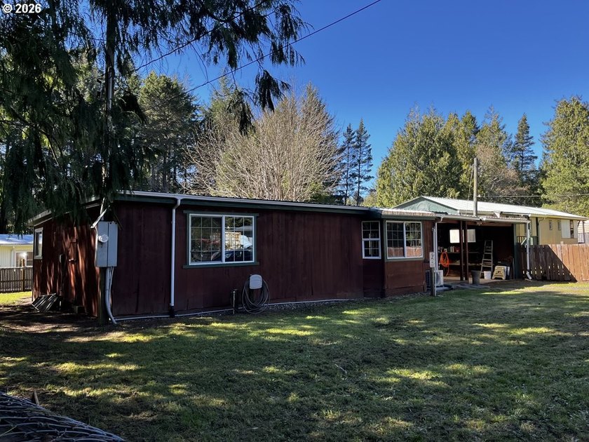 This charming 2-bedroom, 1-bath manufactured home sits on a - photo 44