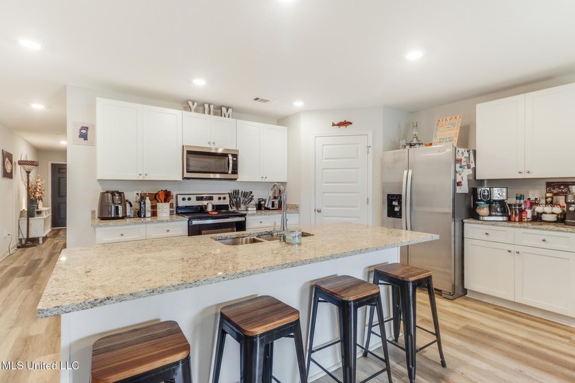 New price! Unlike new builds, this home is truly move-in ready - photo 7