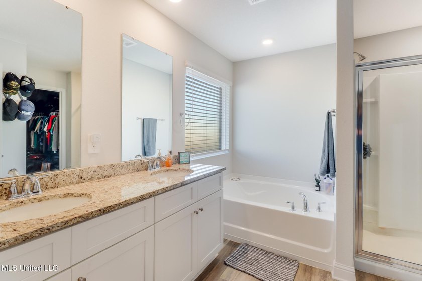 New price! Unlike new builds, this home is truly move-in ready - photo 10
