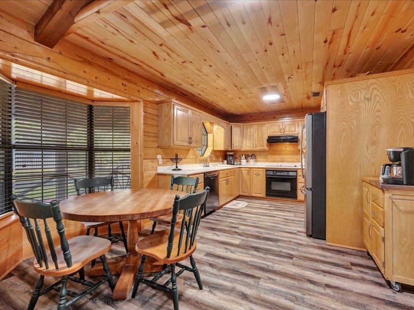 This lake property is special, featuring multiple living - photo 12
