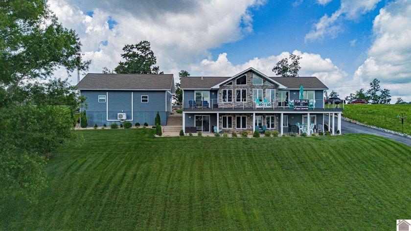 Everything you could ask for in a waterfront home! Newer covered - photo 4