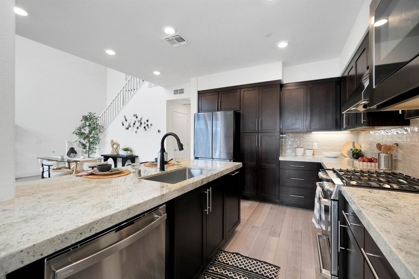 Built in 2021, this sophisticated townhouse-style condominium - photo 11