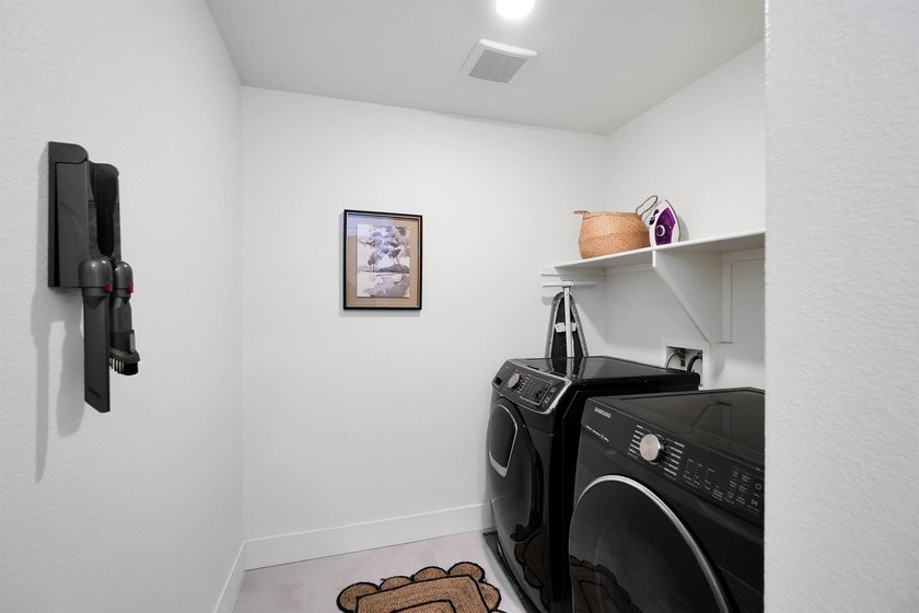 Built in 2021, this sophisticated townhouse-style condominium - photo 15
