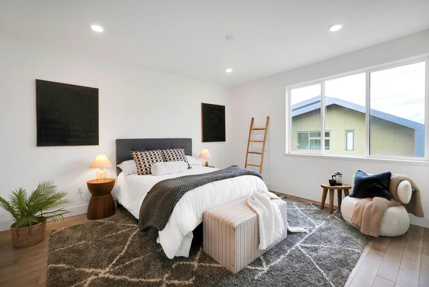 Built in 2021, this sophisticated townhouse-style condominium - photo 18