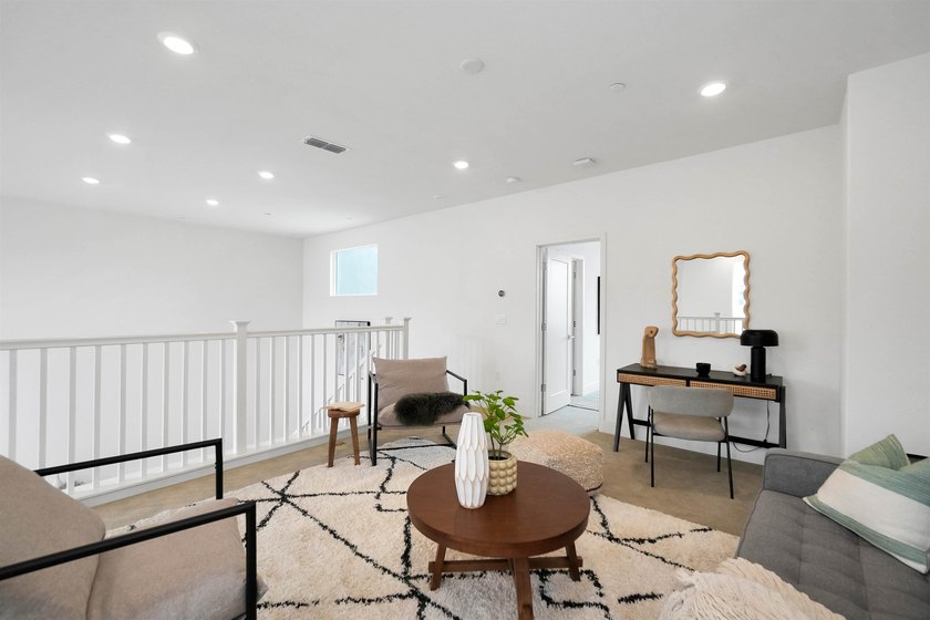 Built in 2021, this sophisticated townhouse-style condominium - photo 24