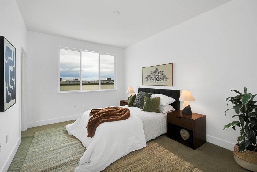 Built in 2021, this sophisticated townhouse-style condominium - photo 25