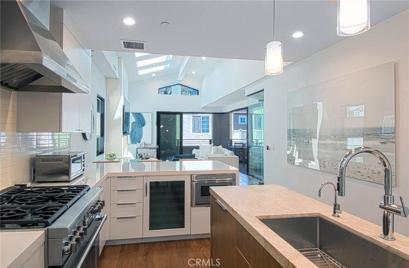 Tucked away on a coveted street south of PCH, this exceptional - photo 7