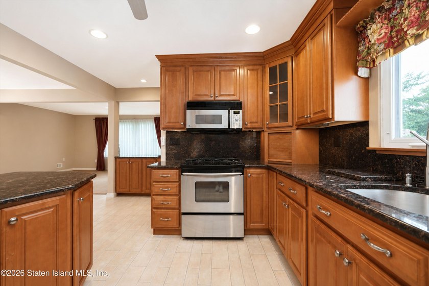 Welcome to 666 Armstrong Avenue, a well-maintained two-family in - photo 13