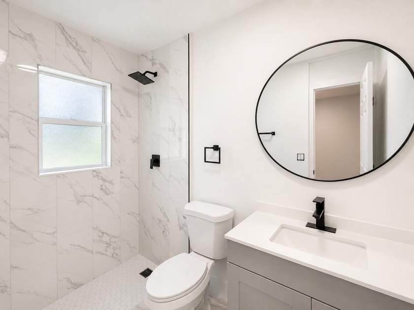 DOUBLE LOT! Stunning fully renovated home on a rare double lot - photo 10