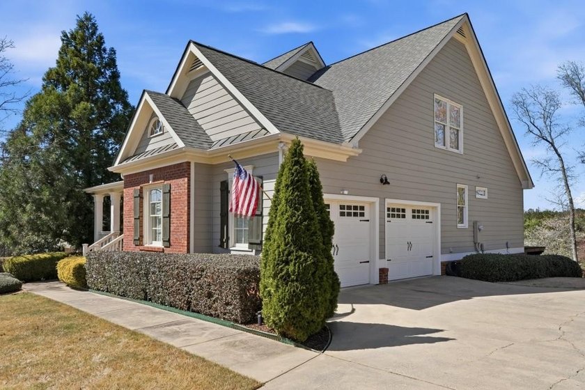 FANTASTIC TRADITIONAL WITH ROCKING CHAIR FRONT PORCH ON .72 ACRE - photo 3