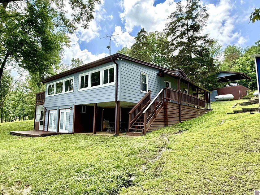 Lakefront living at its finest with this 3 bed, 1.5 bath home on - photo 3