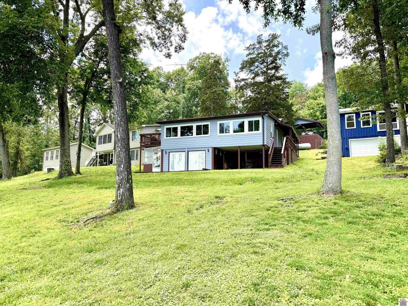 Lakefront living at its finest with this 3 bed, 1.5 bath home on - photo 4