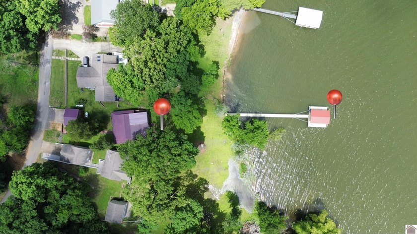Lakefront living at its finest with this 3 bed, 1.5 bath home on - photo 6