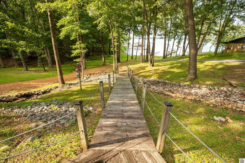 Kentucky Lake retreat with year-round water offering the perfect - photo 8