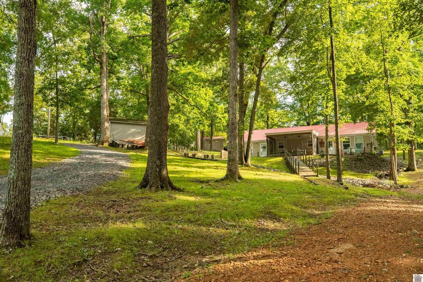Kentucky Lake retreat with year-round water offering the perfect - photo 9