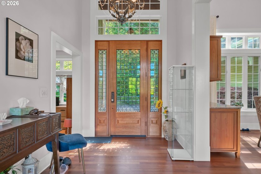 Tucked away on over an acre of wooded privacy, this custom - photo 4