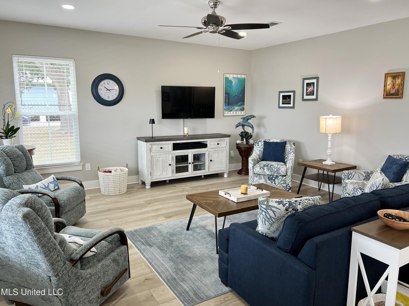 Wake up to coastal breezes and water views in this beautiful - photo 6