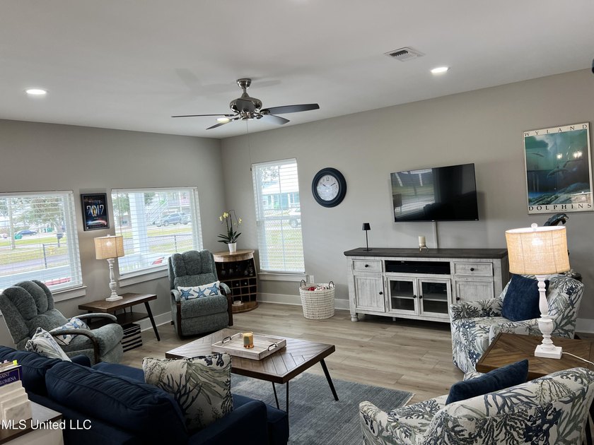 Wake up to coastal breezes and water views in this beautiful - photo 10