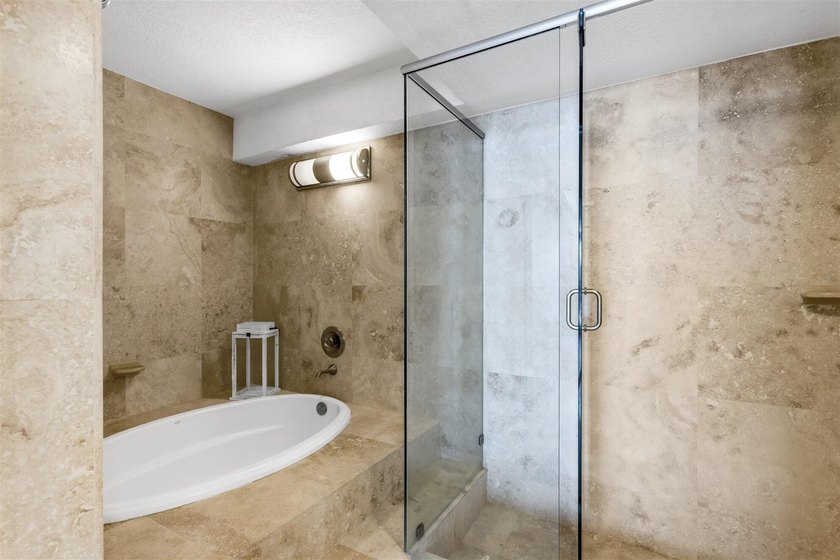 RARELY AVAILABLE BEACHFRONT VILLA OFFERING EFFORTLESS - photo 14