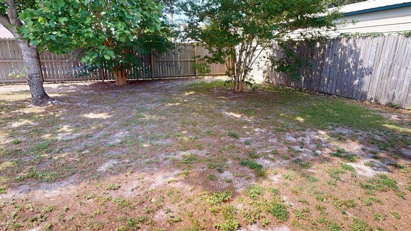 This 3-bedroom, 2-bath home with an attached 1-car garage is - photo 18